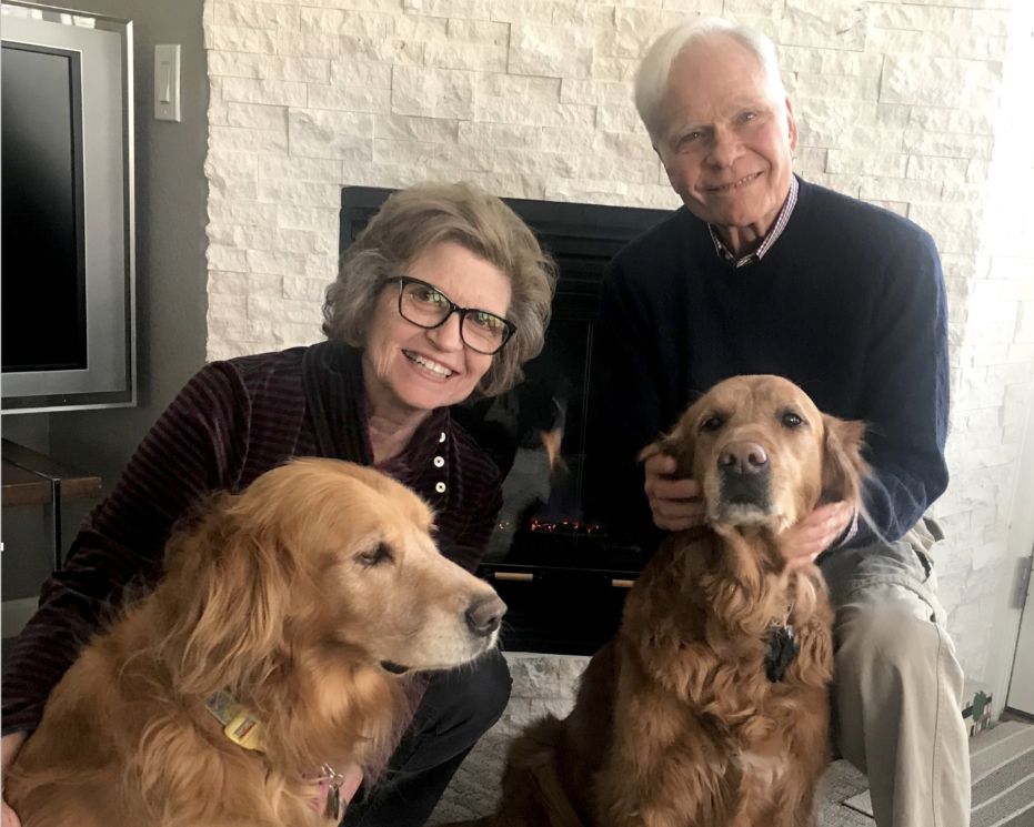 senior couple with their two dogs